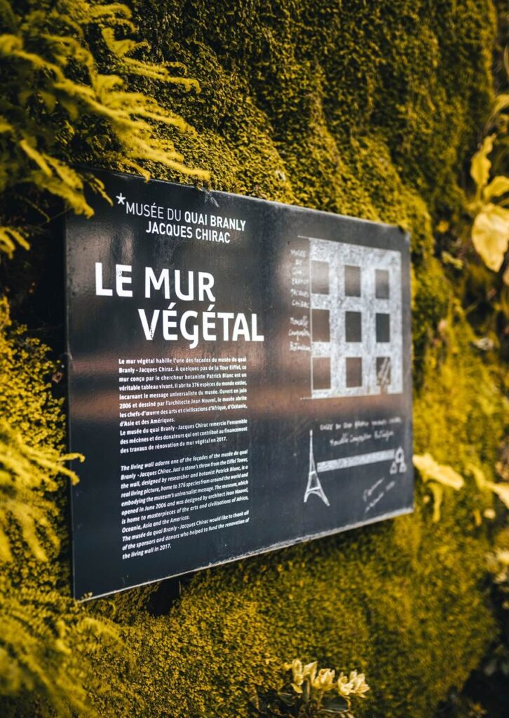 A photo of a sign on a Living Wall in Paris, France.